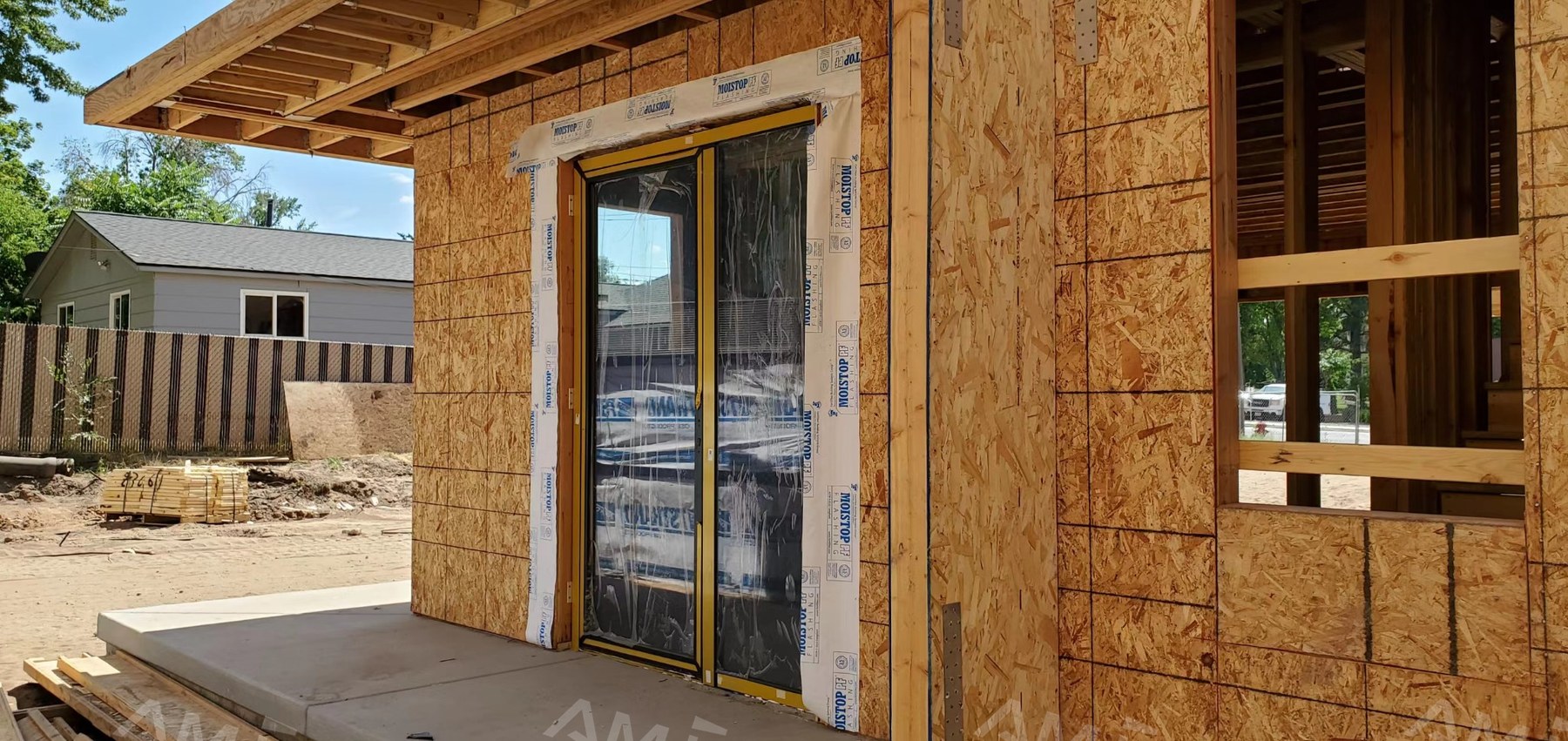 AMJ aluminum sliding door installation exterior view