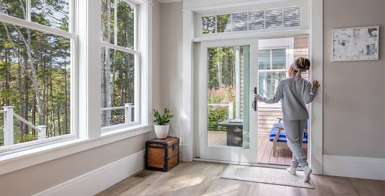 Sliding patio door installation in a prepared exterior wall opening