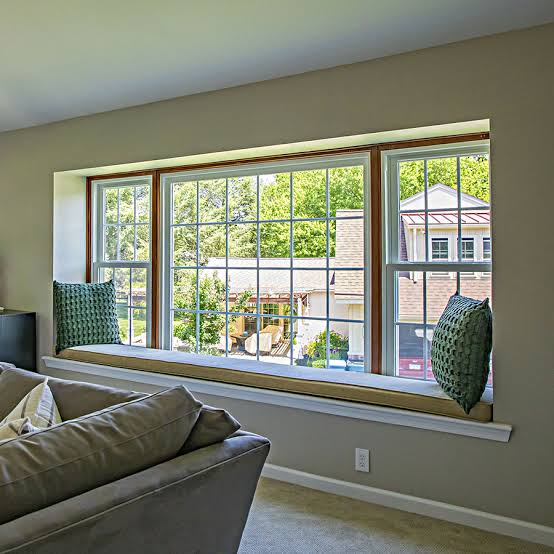 Aluminum picture window with operable side windows combining a large fixed view with controlled ventilation